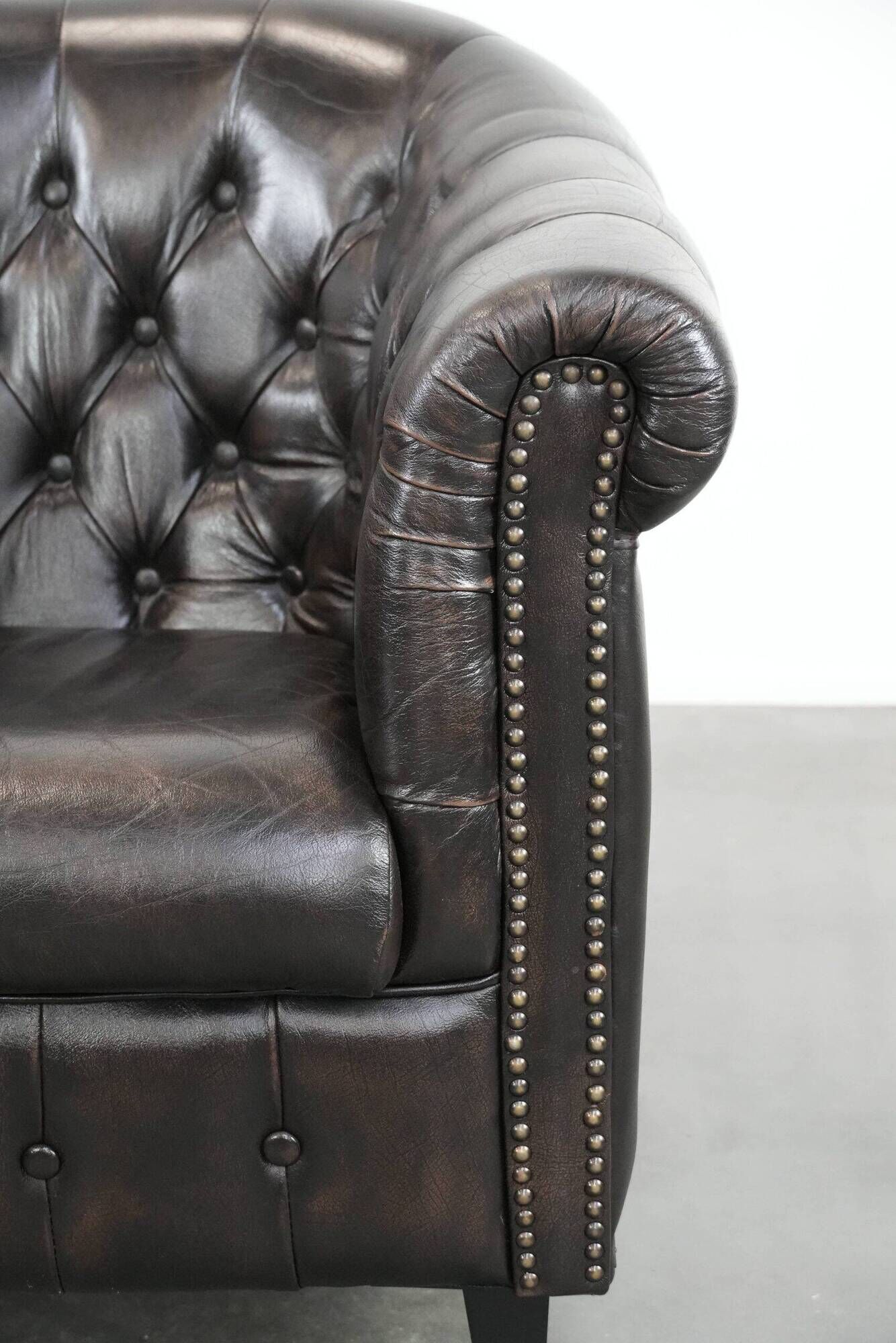 Luxury dark cowhide Chesterfield club armchair in English style
