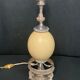 Old lamp foot silver metal and ostrich egg late nineteenth century