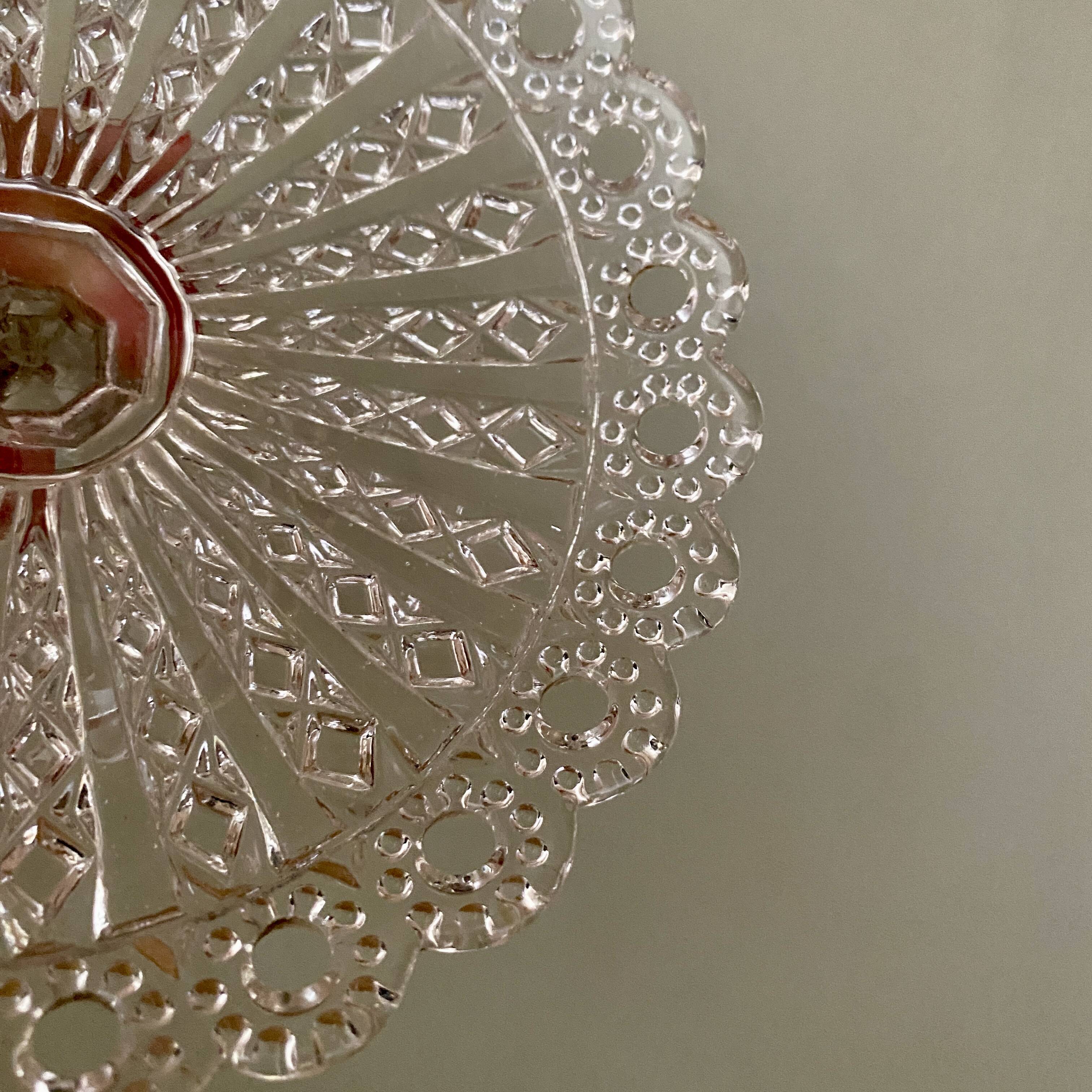 Compotier or footed plate in vintage chiseled glass