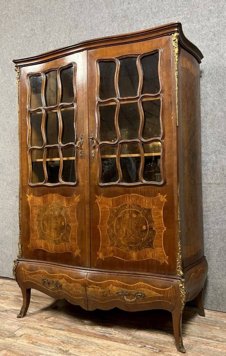 Louis XV style curved bookcase in precious wood marquetry