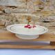 Old presentation plate on red rose foot