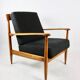 Black boucle chair, Danish design on the cushions, 1970s.