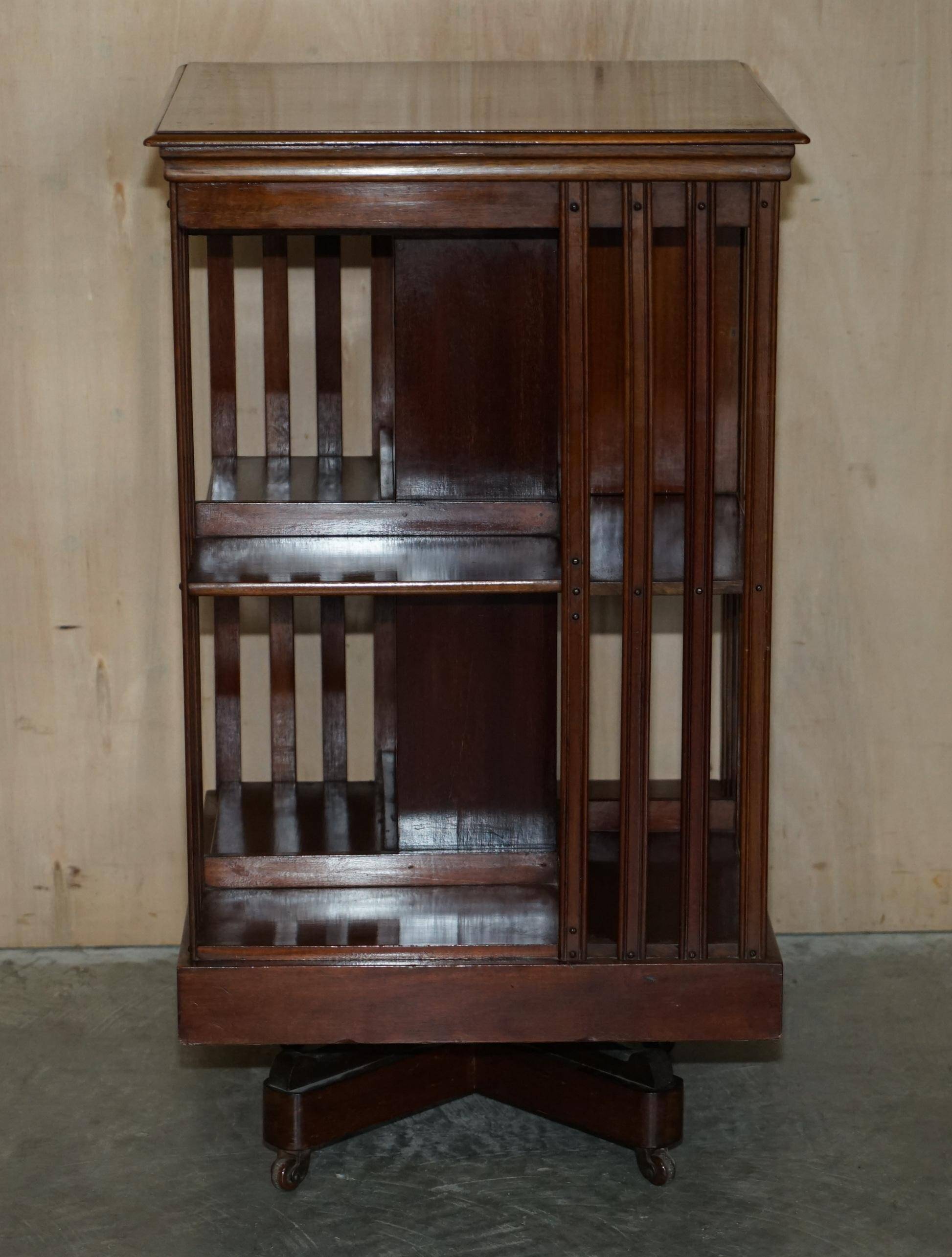 Restored Victorian walnut revolving library.