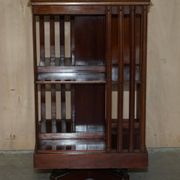 Restored Victorian walnut revolving library.