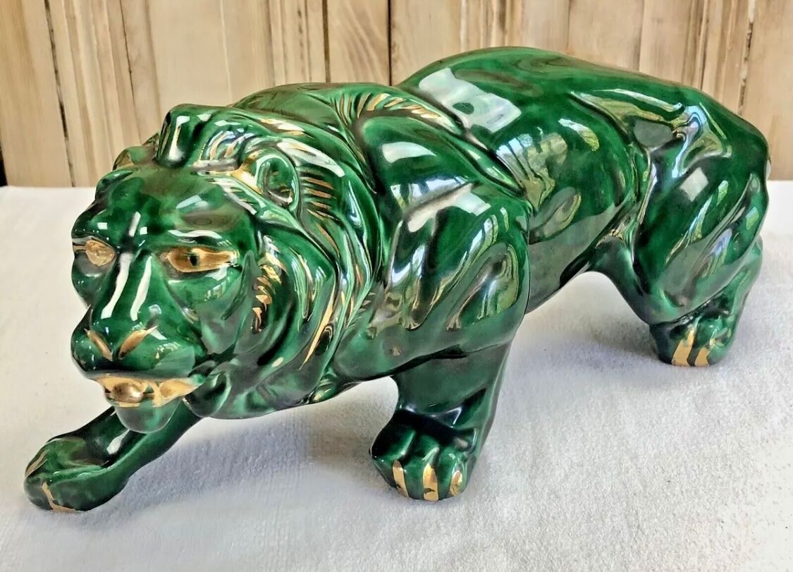 Art Deco lion statue cracked St Clement