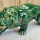 Art Deco lion statue cracked St Clement