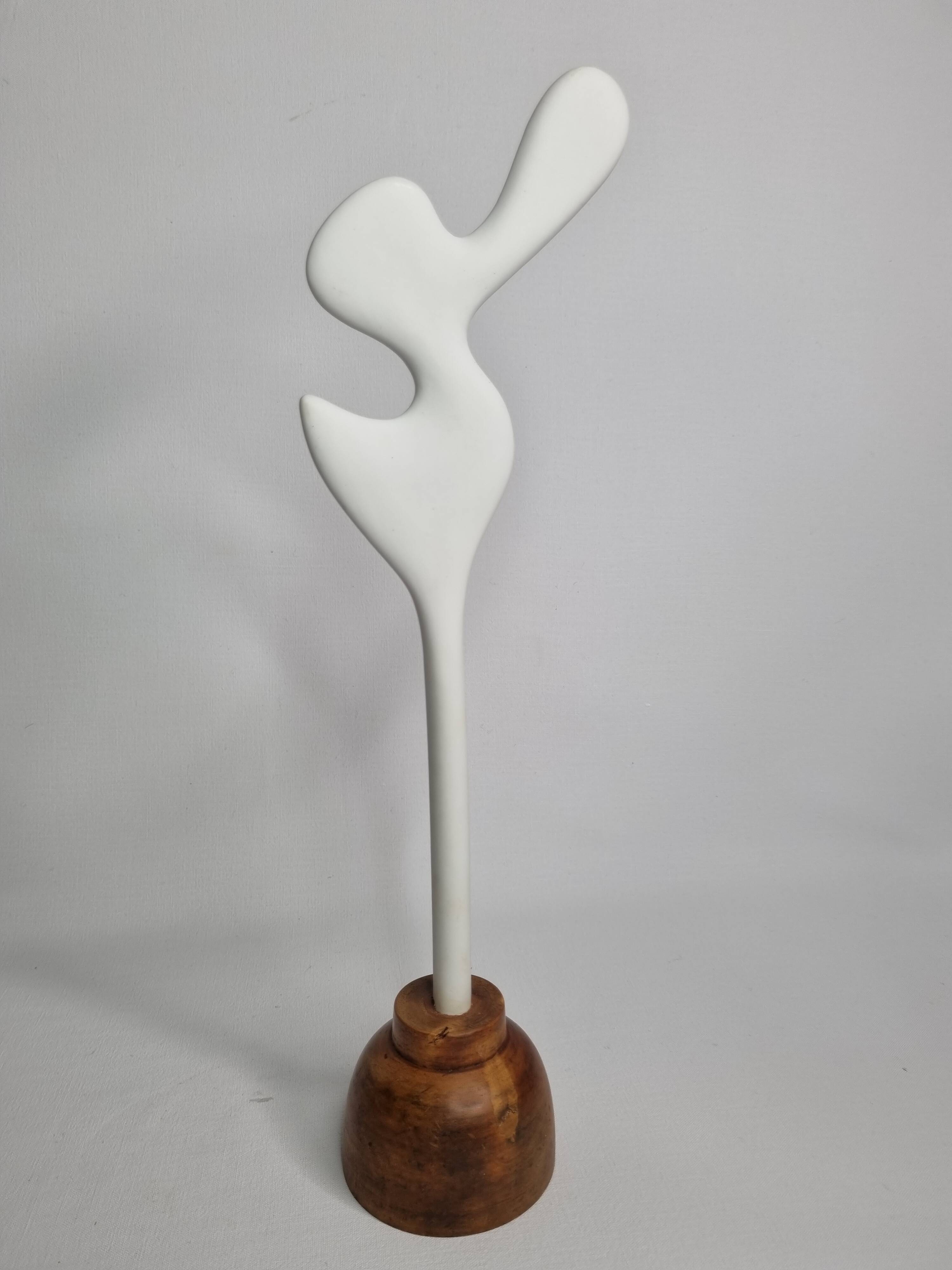 Biomorphic-inspired sculpture, on an industrial wooden base, 37 cm