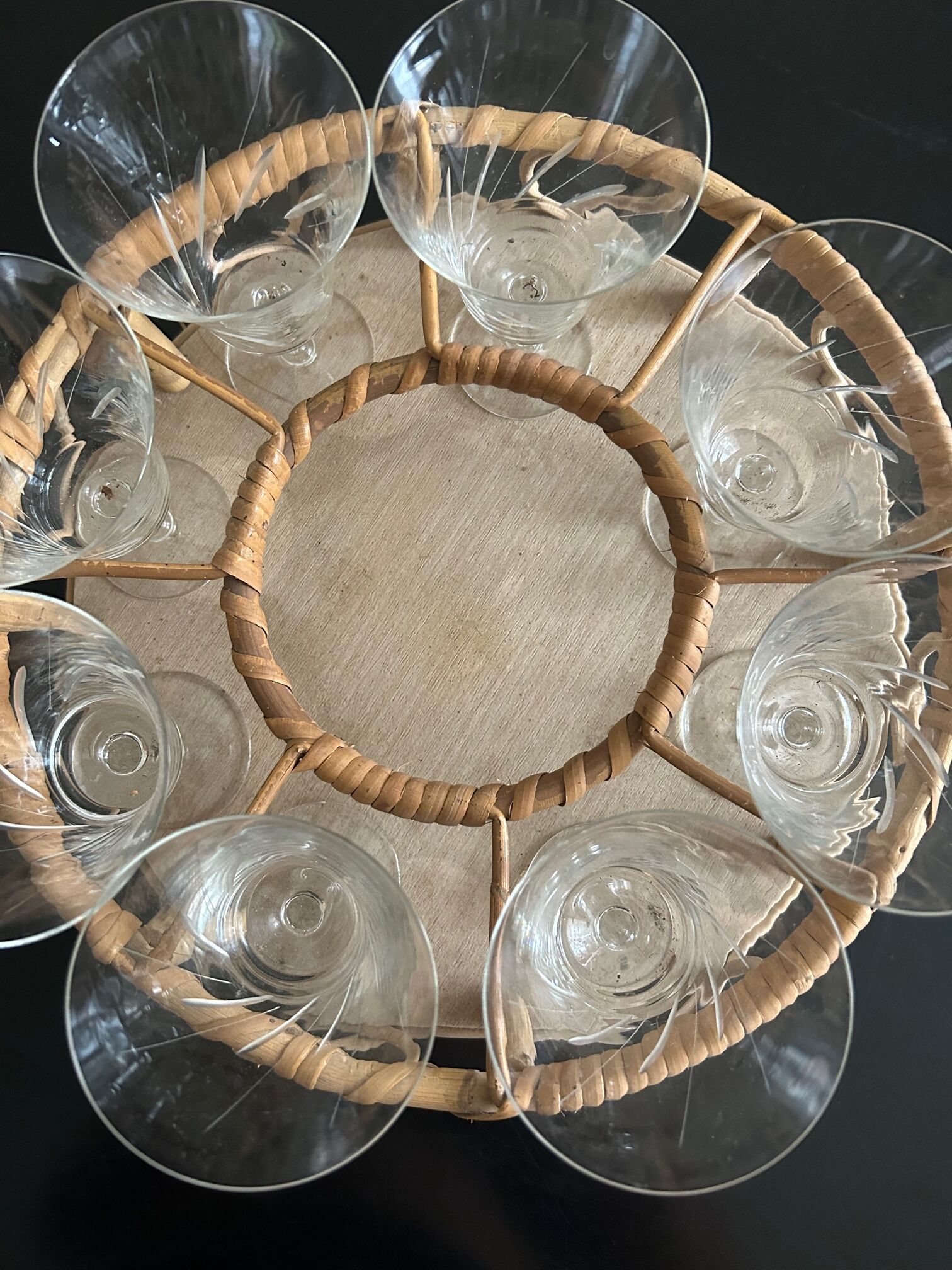 Wicker basket and 8 antique glasses
