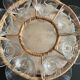 Wicker basket and 8 antique glasses