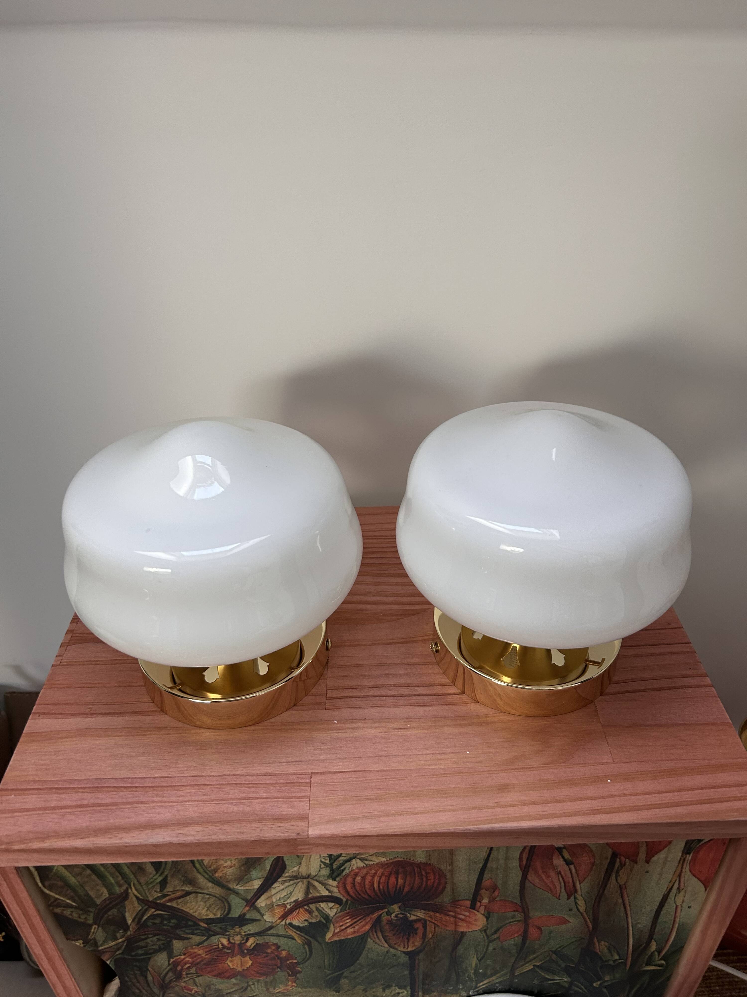 Pair of white opaline globe wall lights