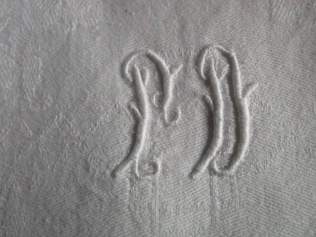 11 old damask napkins, monogrammed