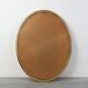 20th century neo-classical style tilted oval mirror by Deknudt, Belgium