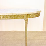 Oval coffee table in marble and brass