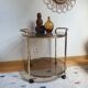 Desserte vintage laiton à roulettes plateaux en verre