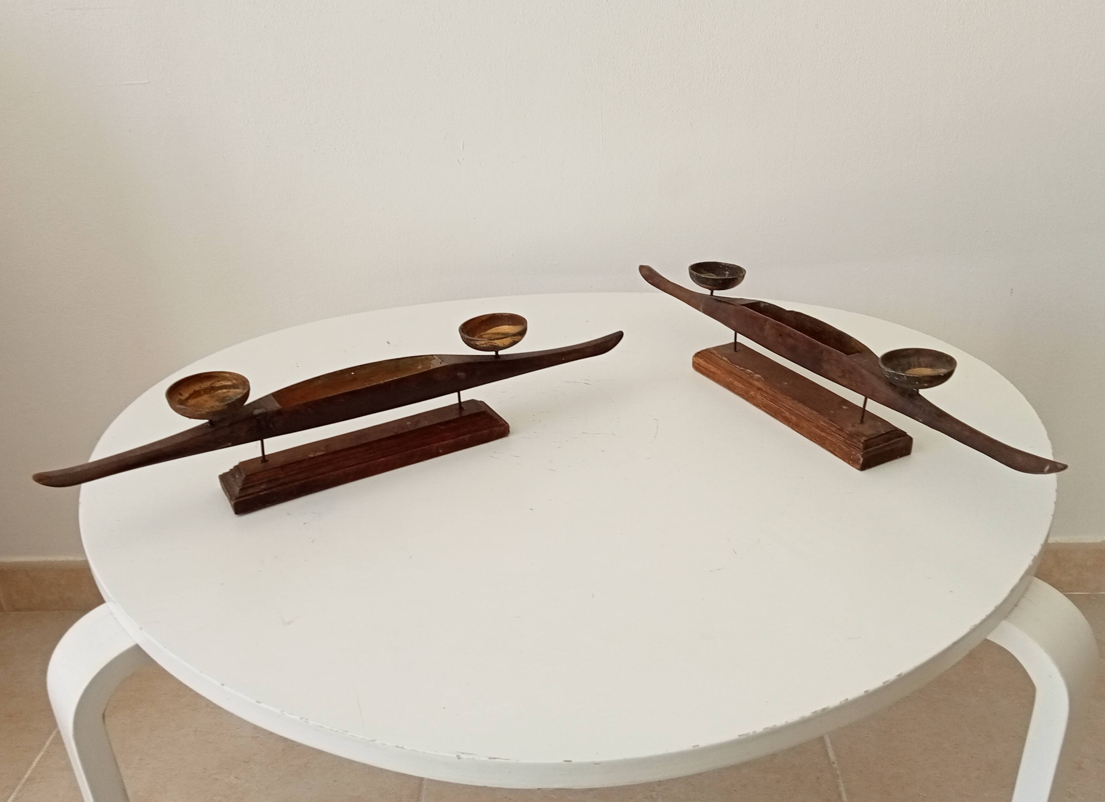 Vintage chandelier in solid carved teak.