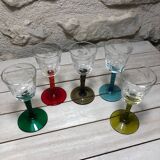 Antique and rare! Sold in a set of 12 colorful twisted stemmed glasses engraved with flowers and leaves