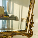 Large golden mirror parecloses