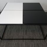 Square coffee table has checkered 80s