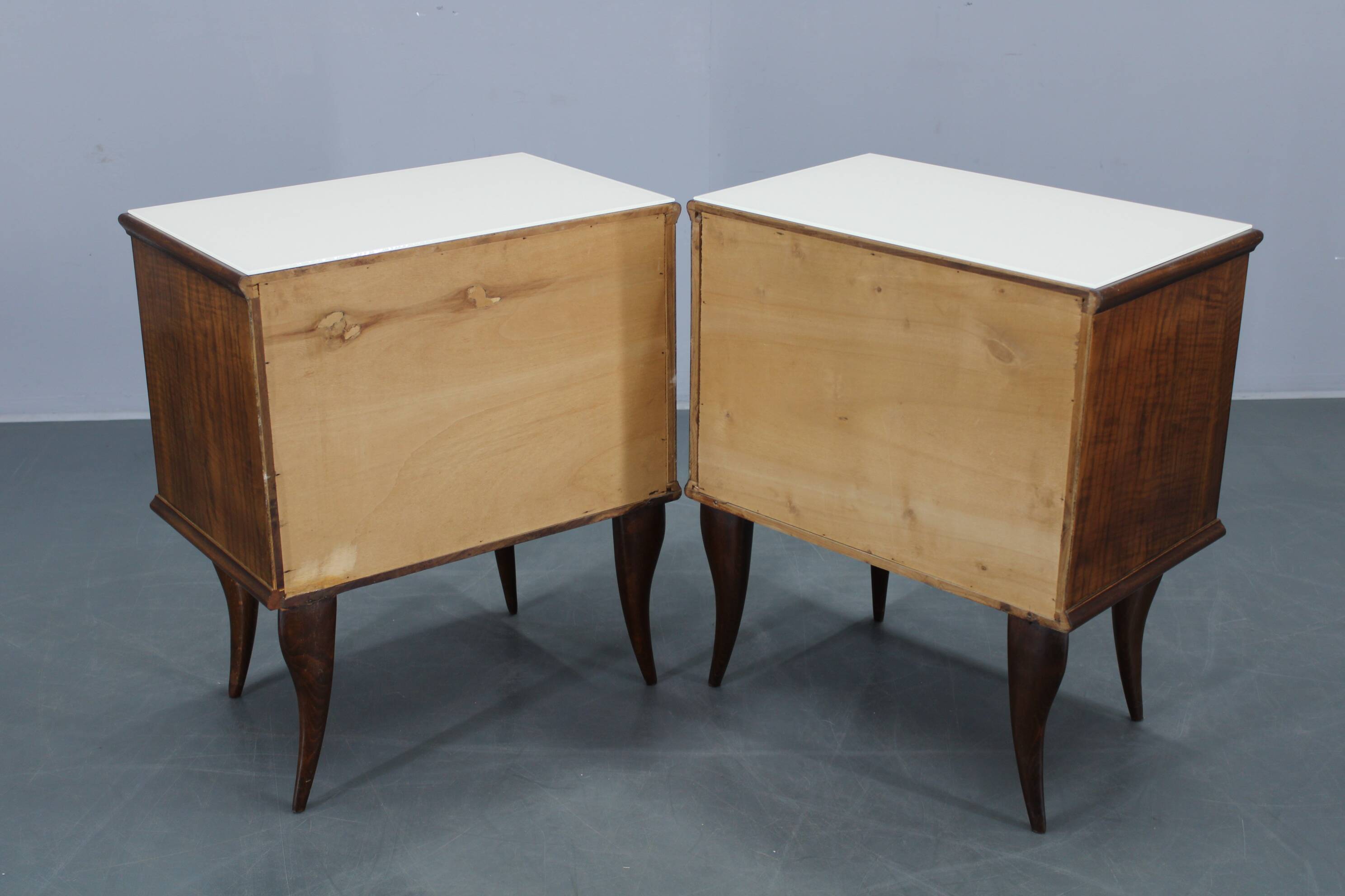 Pair of mid-century Italian walnut nightstands with glass top, 1950s