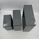 3 nesting shelves in grey lacquer.