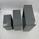 3 nesting shelves in grey lacquer.