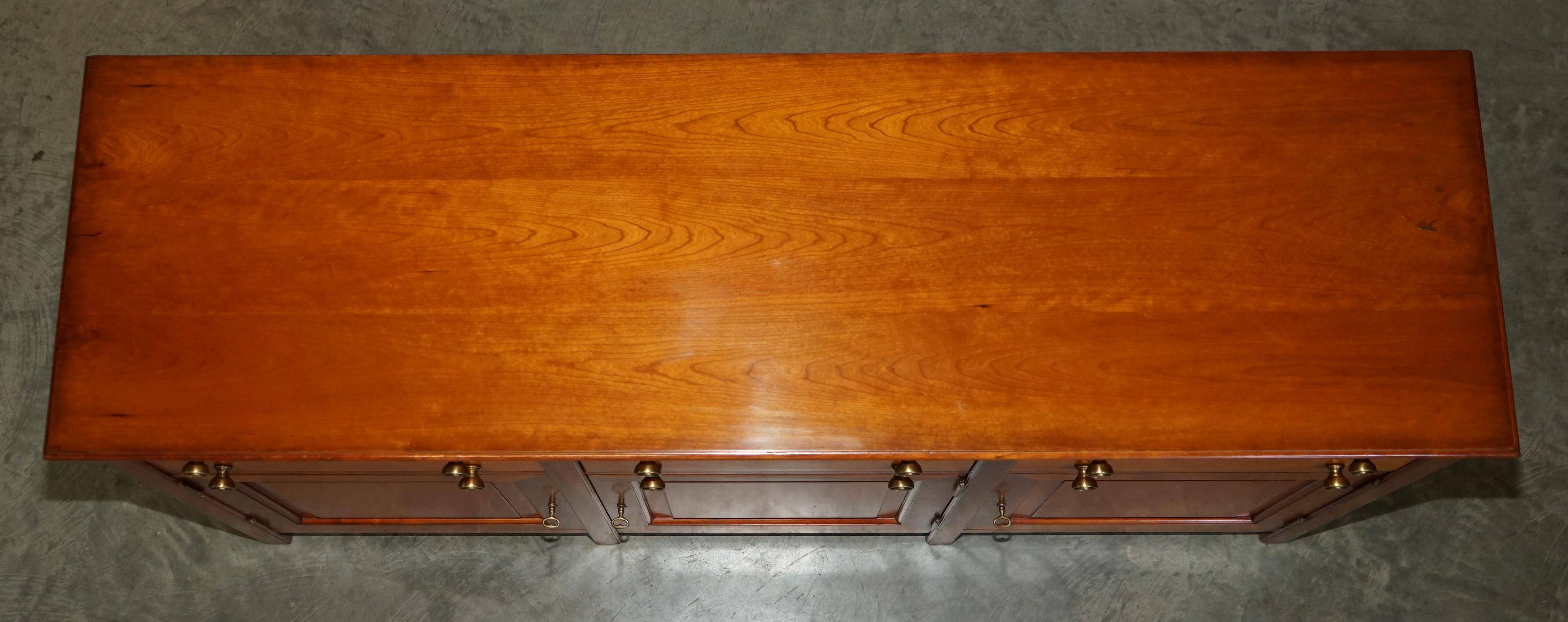 Large buffet Multiyork in solid cherry wood with six drawers.