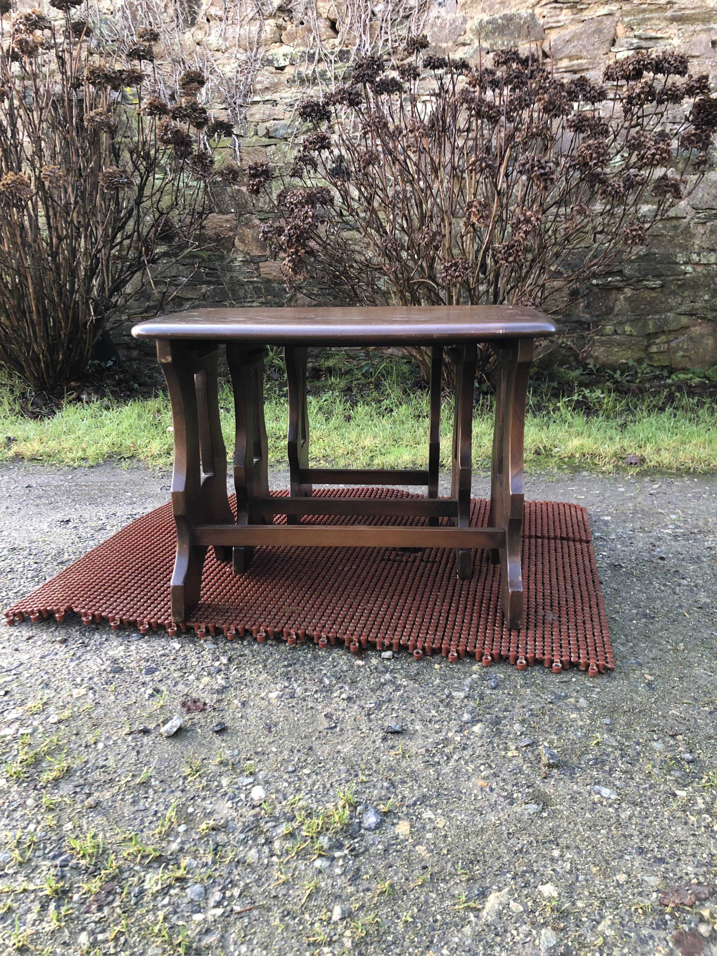 Vintage English nesting tables in elm.