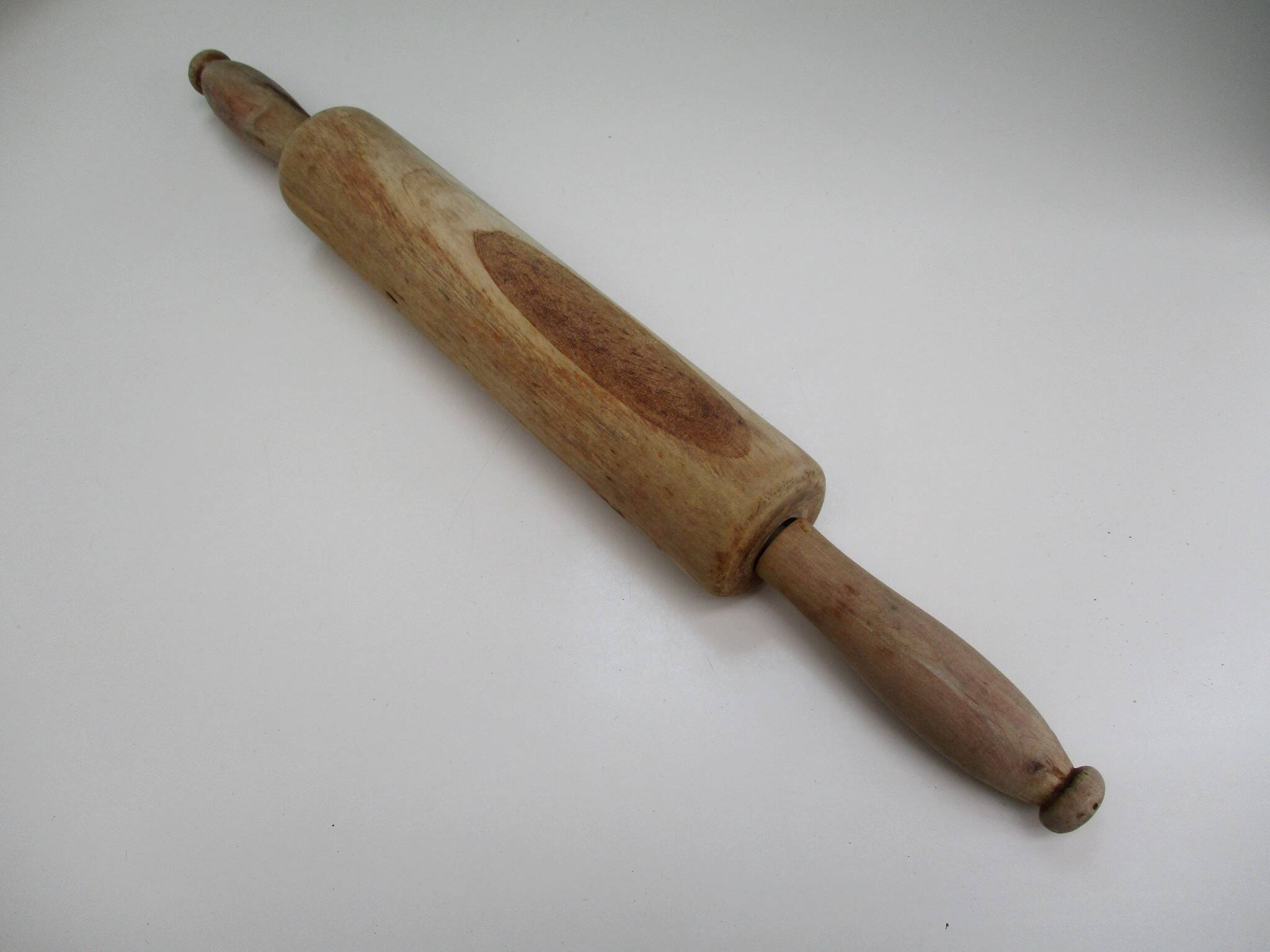 Vintage rolling pin, made of wood.