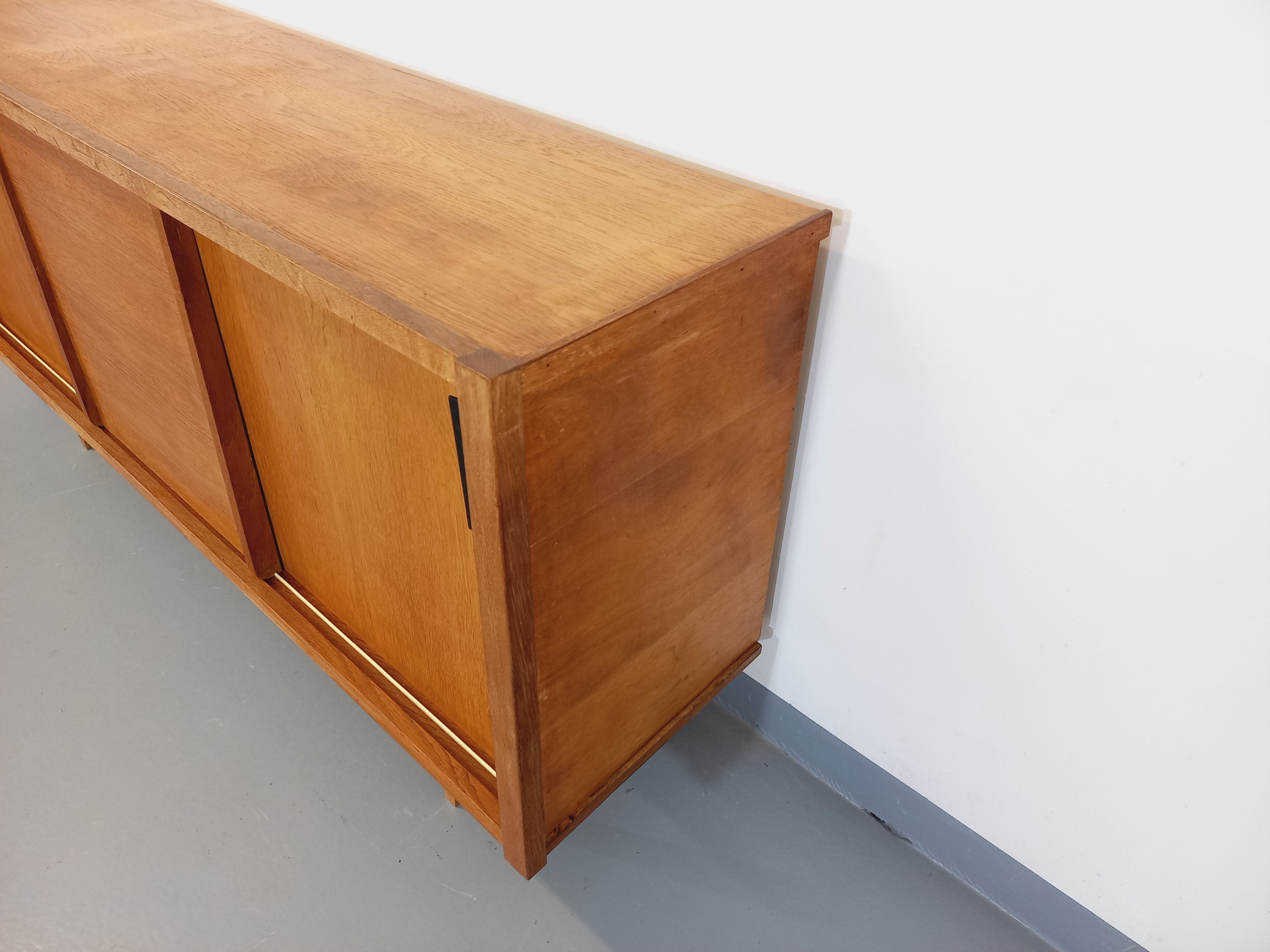 Vintage row in light oak wood from the 60s