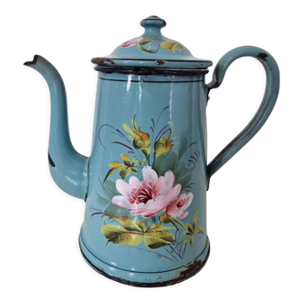 Old enamelled coffee maker, flowers in relief