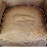 Nice, subtle cowhide armchair with a reversible kilim seat cushion