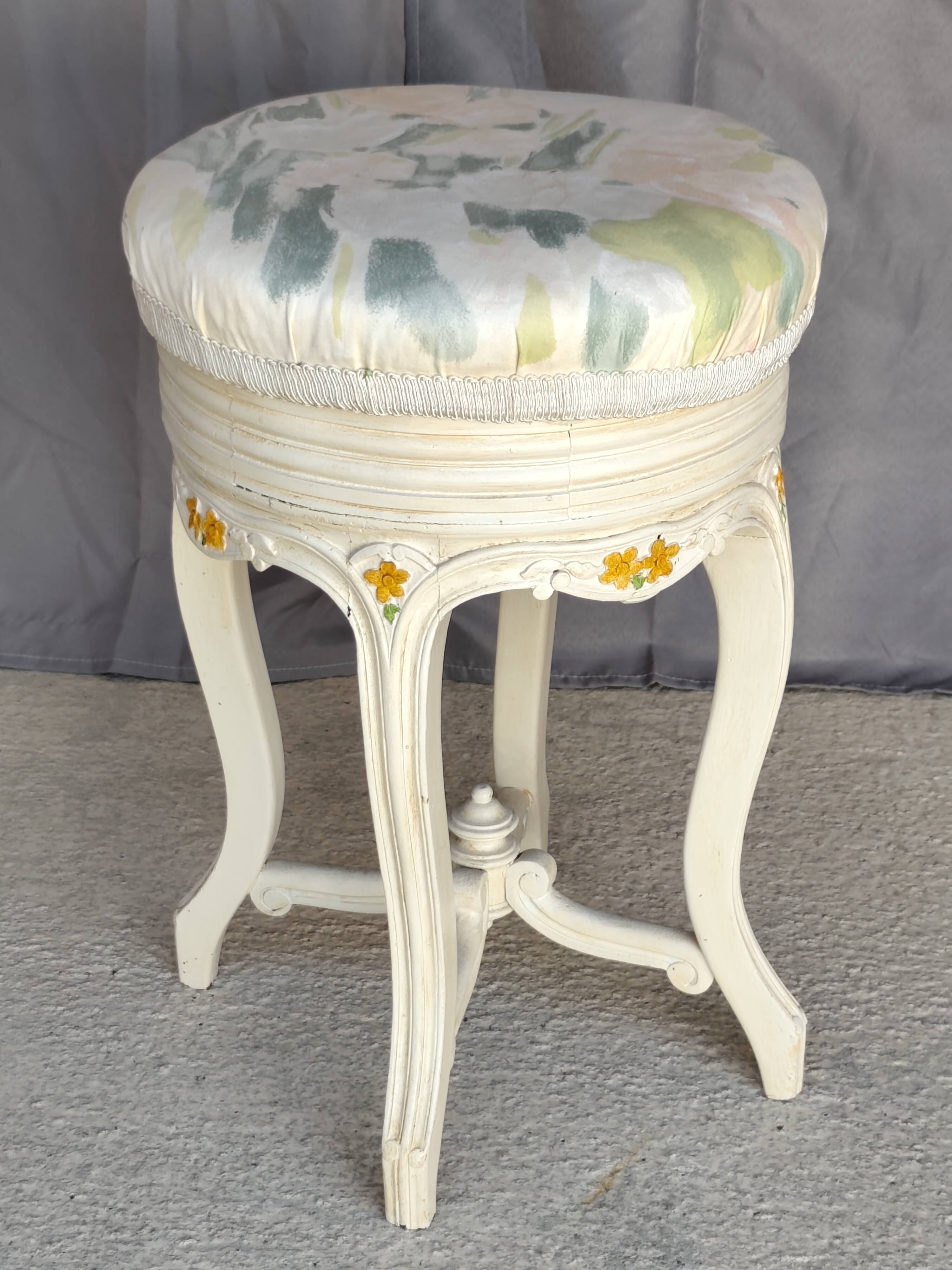 Antique upholstered stool "with screws"
