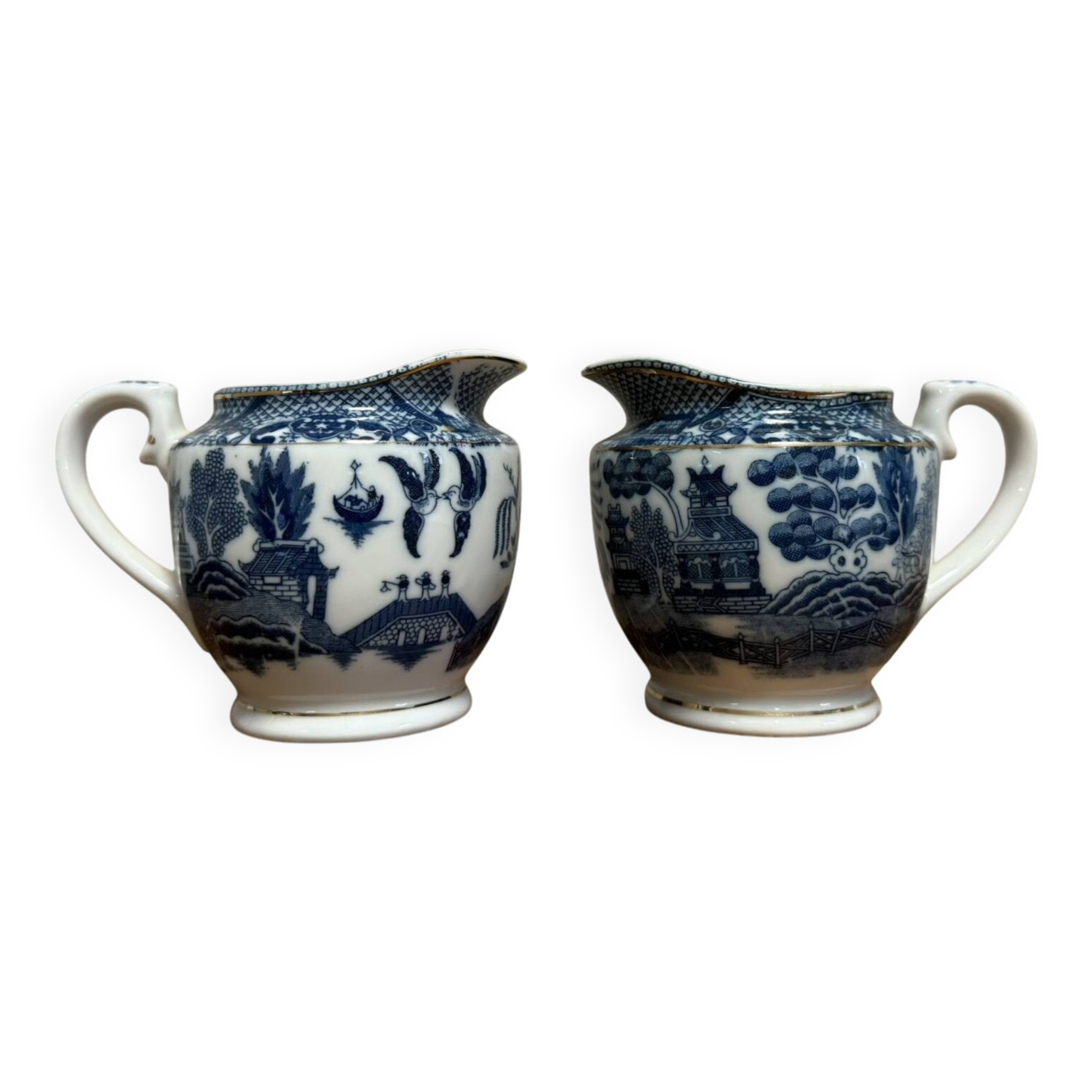 pair of English porcelain jugs with Asian decorations