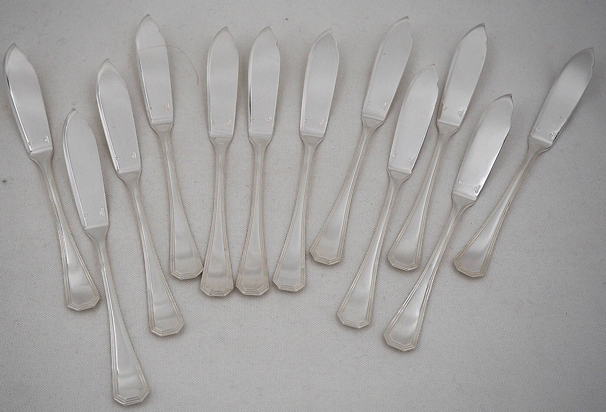 Christofle America, Art Deco 12 fish cutlery, 24 pieces silver-plated metal.