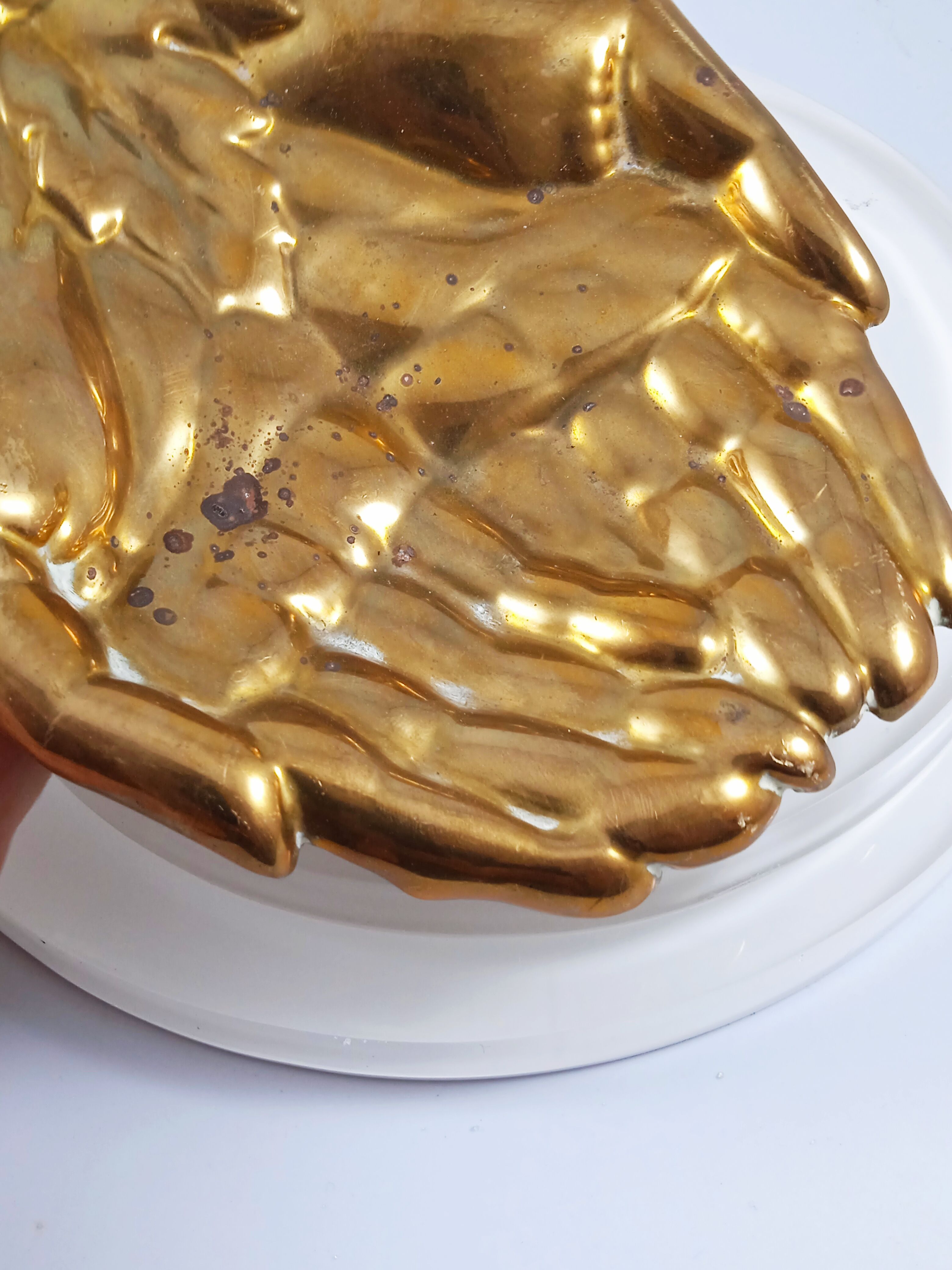Antique hand-shaped brass soap holder