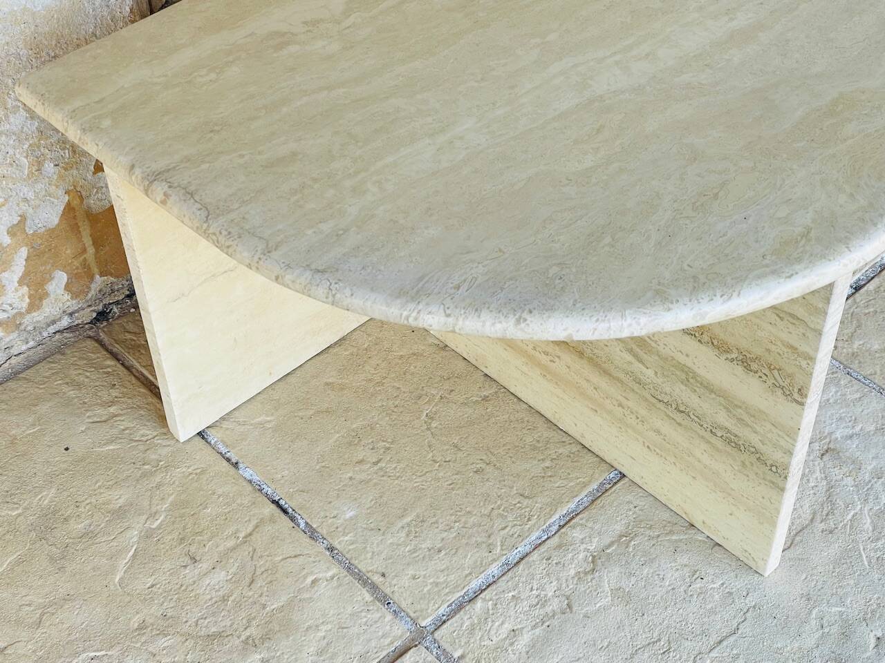 Vintage side table in travertine, circa 1980s.