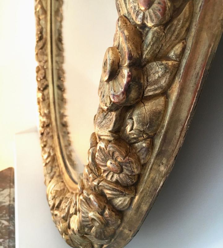 Oval mirror in gilded wood 125 cms French 18th century work