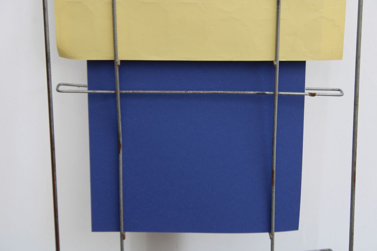 Former metal newspaper display