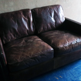 Patinated brown stitched leather 2 seater sofa with brass studs