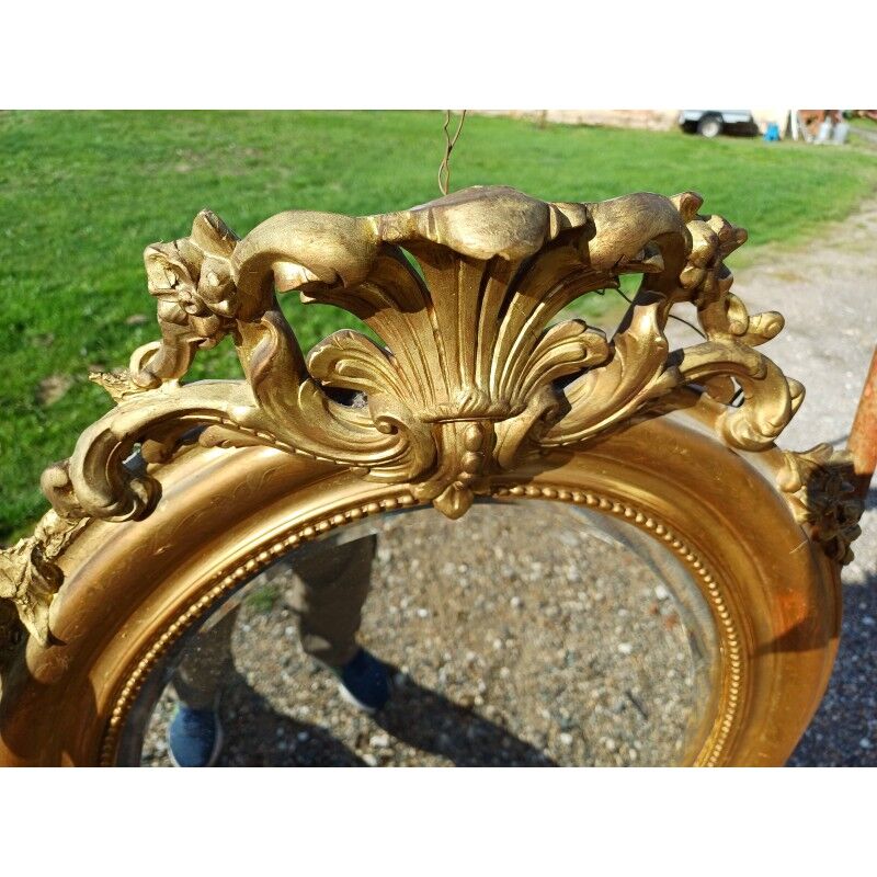 Miroir ovale en bois et stuc doré 19ème