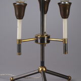 Modernist table lamp in black and gold lacquered metal
