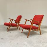 Pair of armchairs in mottled red and wood by Uluv, former Czechoslovakia 1960