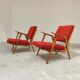 Pair of armchairs in mottled red and wood by Uluv, former Czechoslovakia 1960