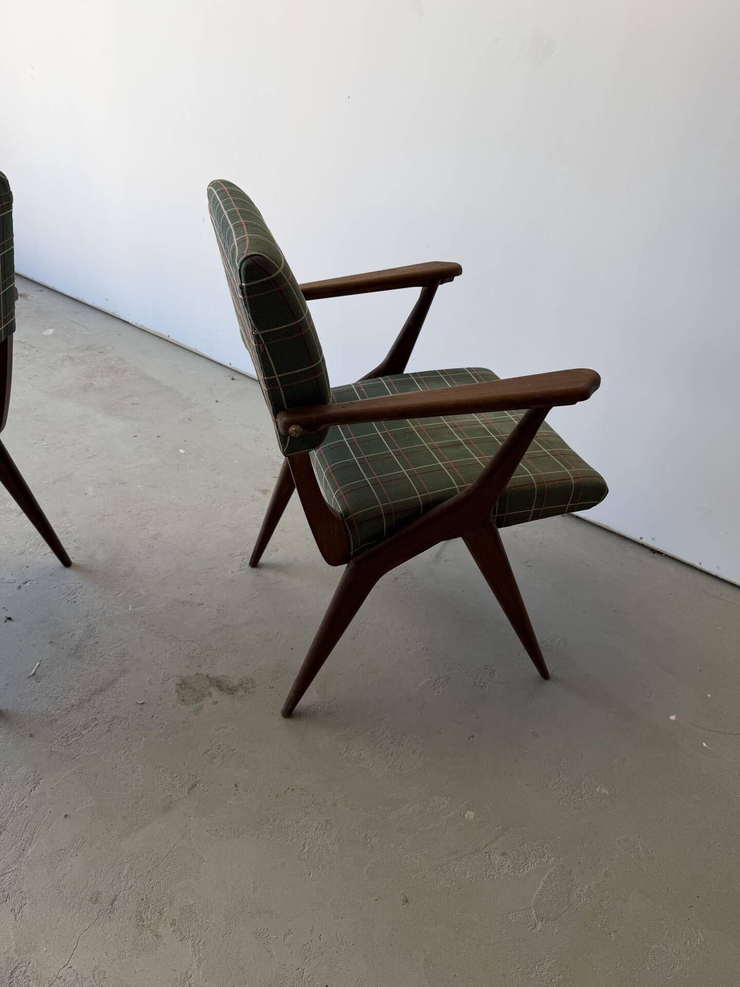 Pair of armchairs with a Scandinavian design in vintage teak from the 1960s.