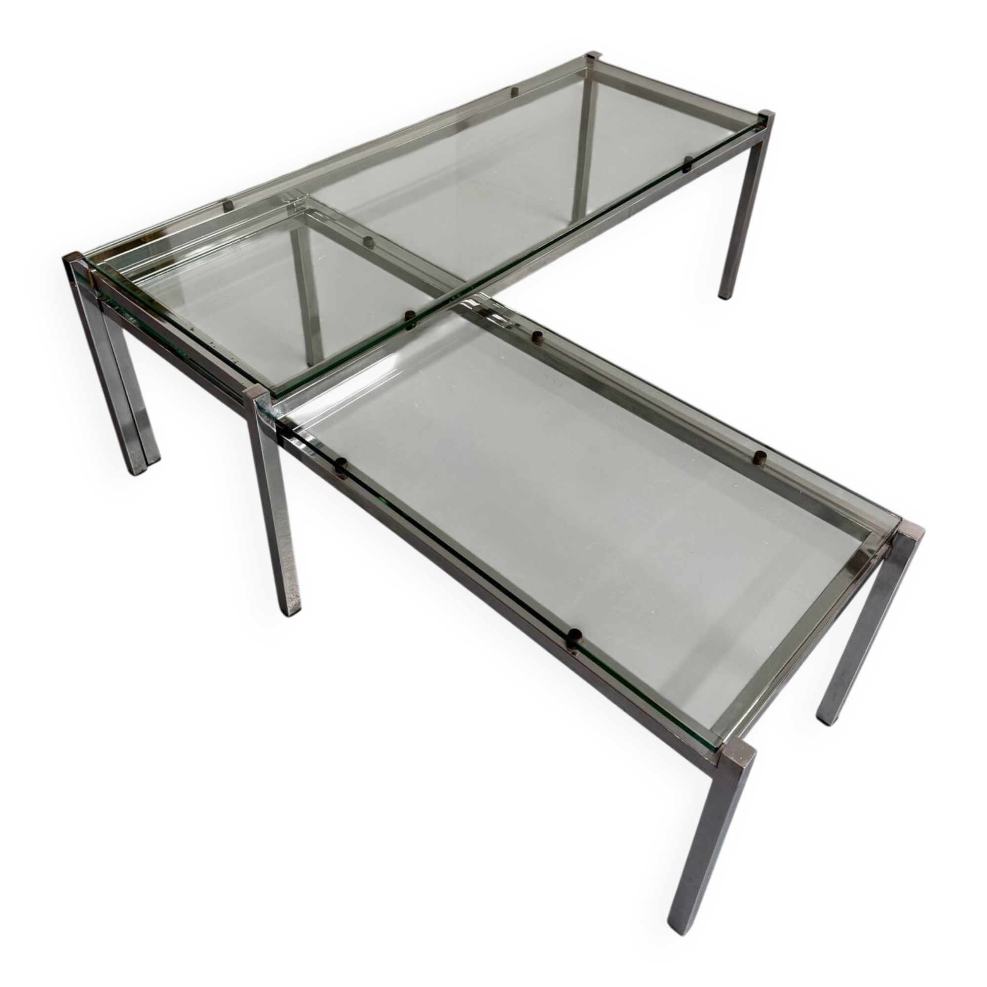 2 large nesting coffee tables in chrome and glass, 1970s design.