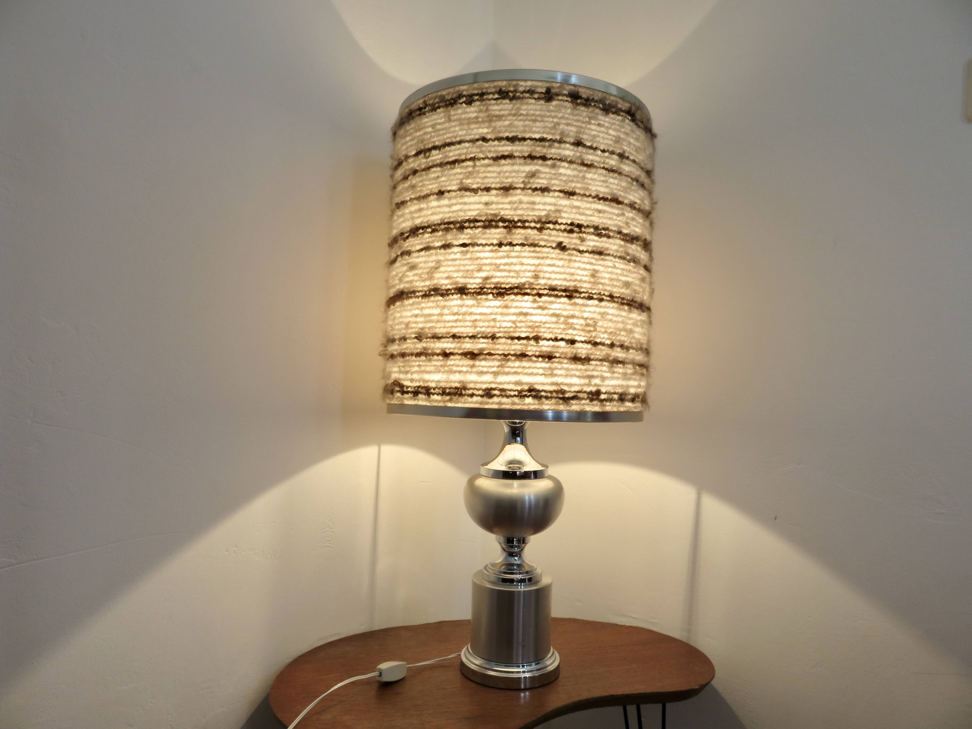 Brushed aluminum and chrome lamp typical of the 70s