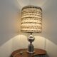 Brushed aluminum and chrome lamp typical of the 70s