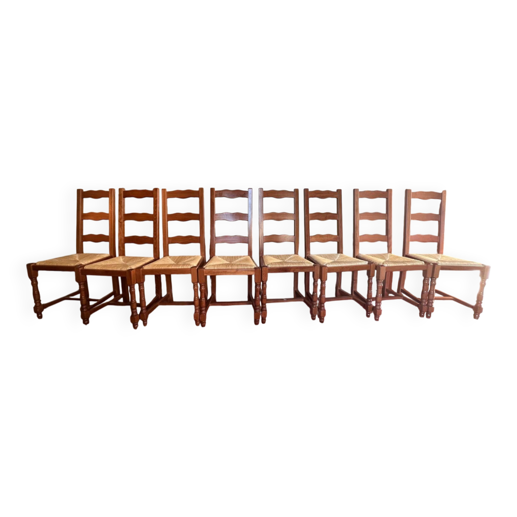Set of 8 solid varnished oak chairs in excellent condition