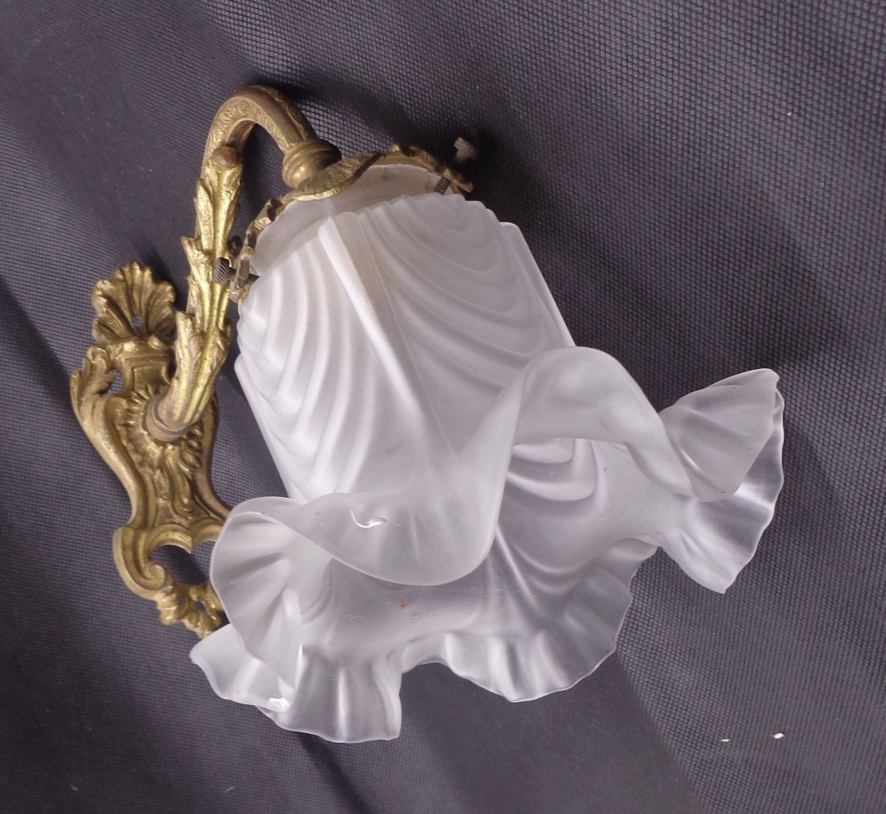 Sconce in golden bronze