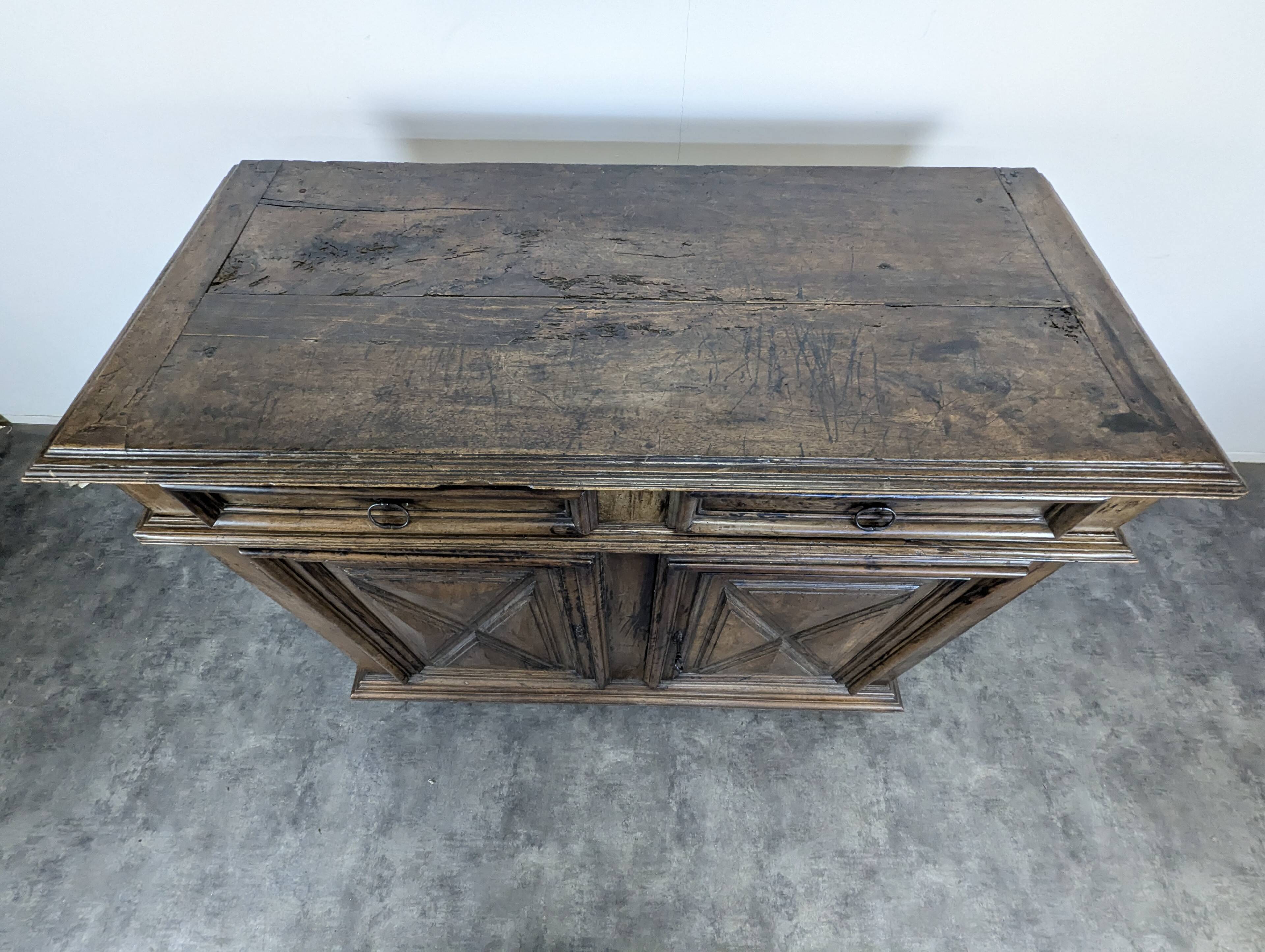 High walnut buffet from the Louis XIV period, late 17th century.